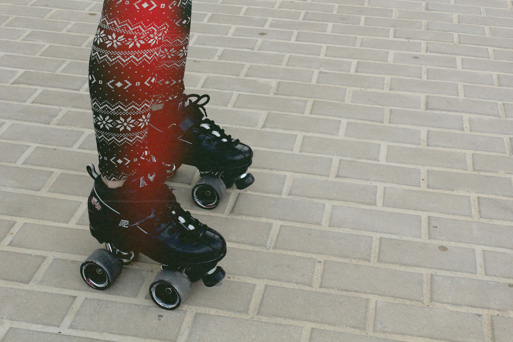 Person Wearing Black Roller Skates and Patterned Leggings — Photo by Image Catalog