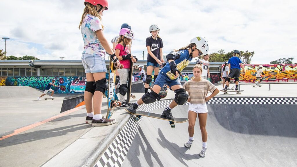 Young skateboarders taking part in a Girls Skate NZ session at an Auckland skatepark