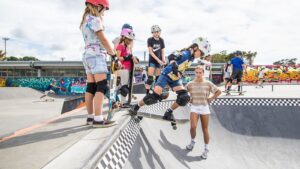 Young skateboarders taking part in a Girls Skate NZ session at an Auckland skatepark