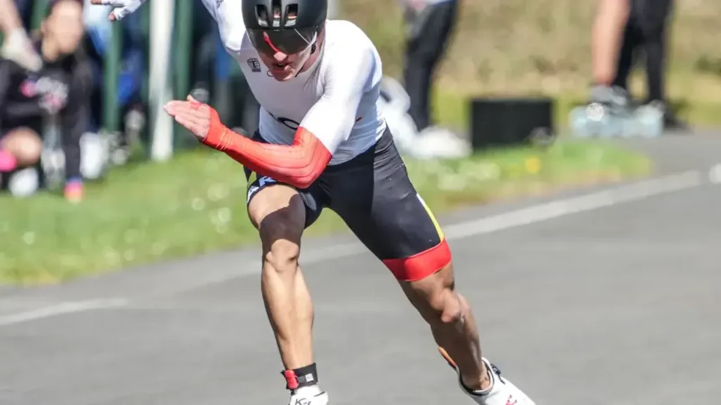 Dutch inline speed skater sprinting during a national-level road competition