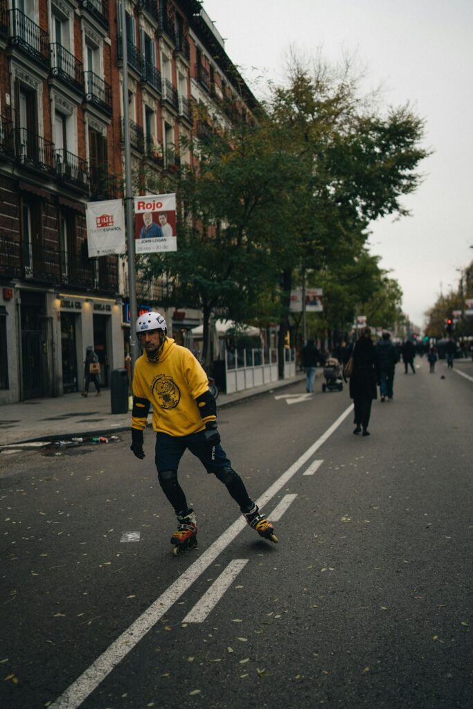 Inline skater moving quickly along an outdoor road course
